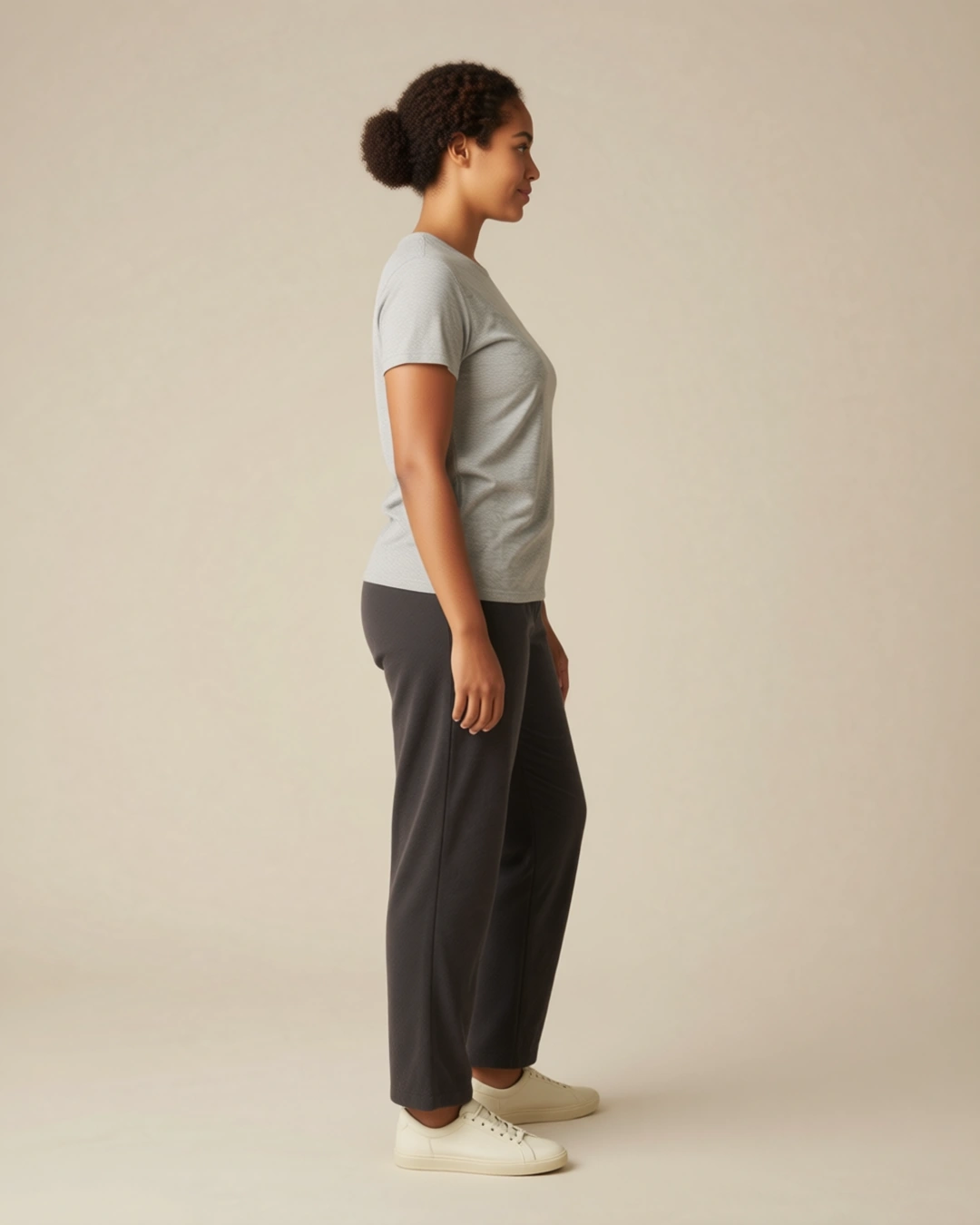 Sample A in the neutral reference outfit, side view. Curated sample image.