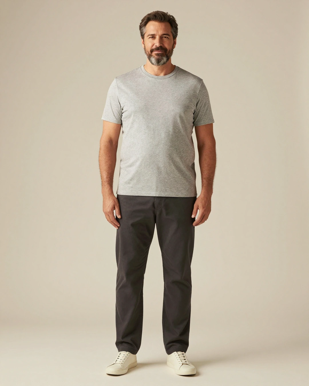 Sample B in the neutral reference outfit, front view. Curated sample image.