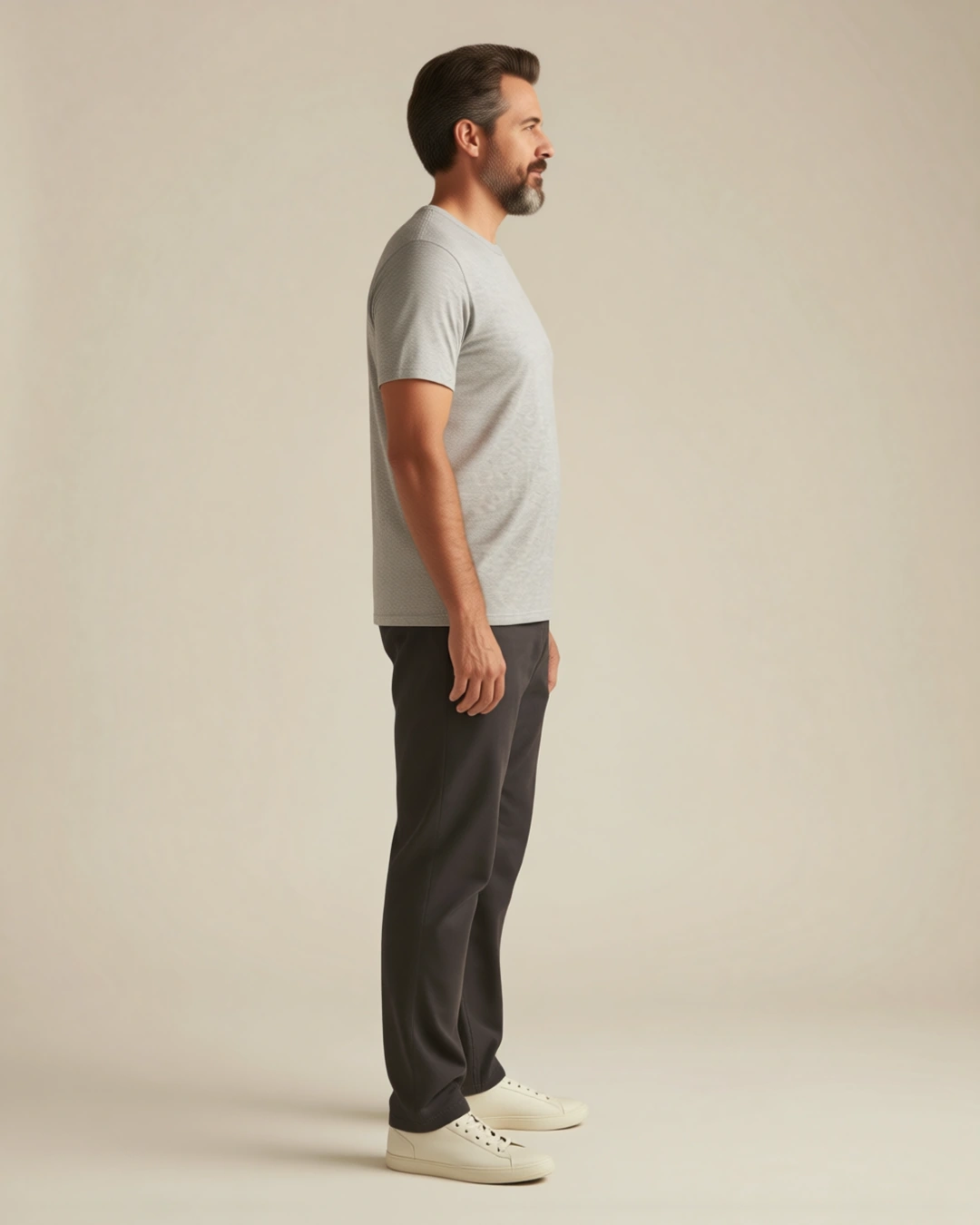 Sample B in the neutral reference outfit, side view. Curated sample image.